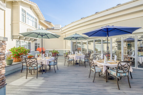 Outdoor bistro dining photography for senior living in Fremont Hills, CA